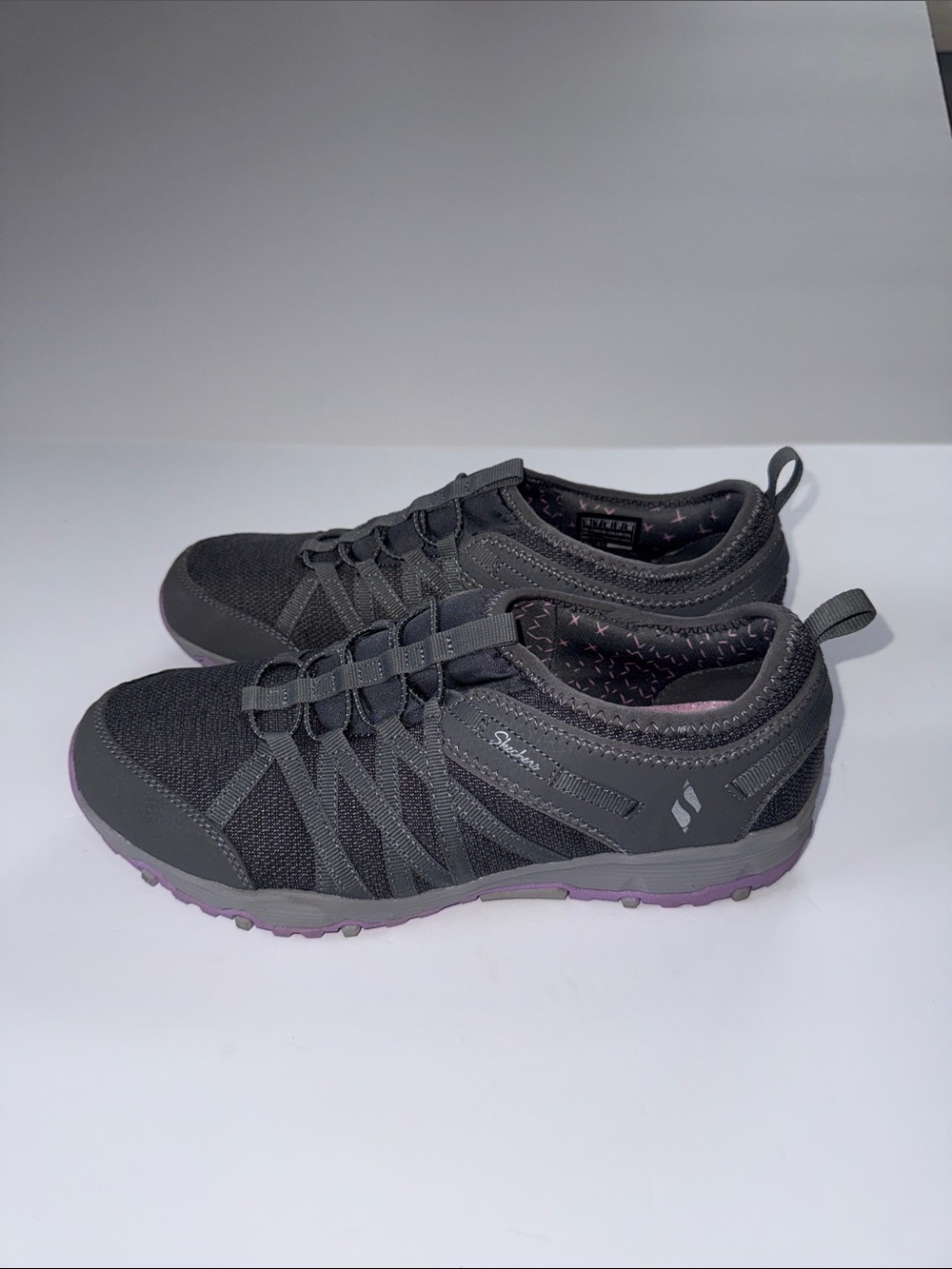 Skechers Women's Dark Gray Athletic Slip-On Sneakers with Purple Outsole